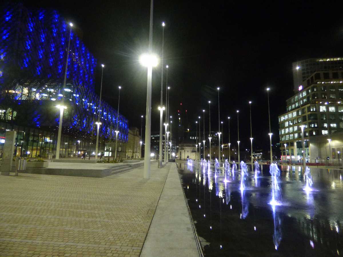 Centenary Square lit up after dark with the Water Jet fountains